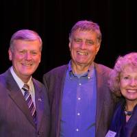 President Haas, and Marcia Haas are posing with Fred Keller.